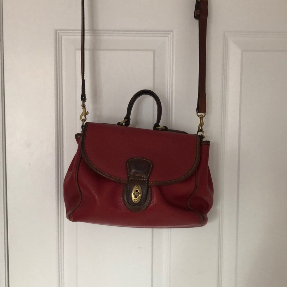 Red Coach bag with handle and removable strap